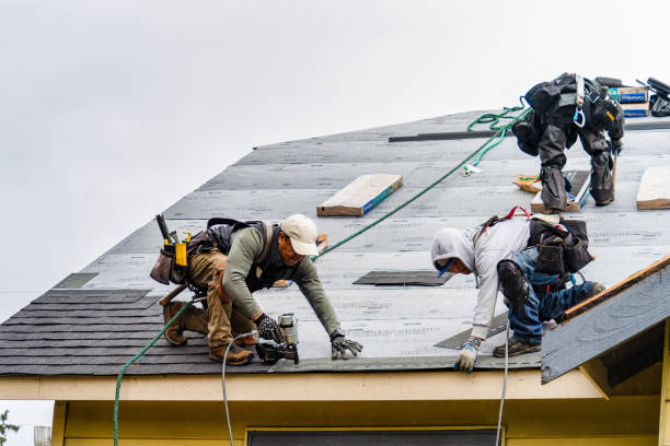 Professional Roofing technician working in Lowell, VT
